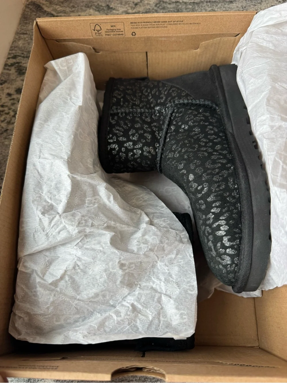 UGG Classic Mini Boot in Black Snow Leopard. Size 6 Youth/ 37 Euro. EUC